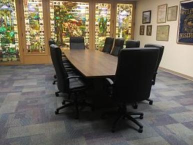 Historic Board room with O.C. Barber Mansion stained glass windows